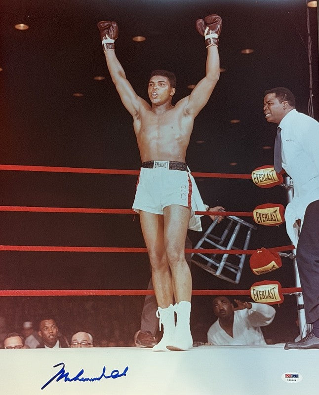 MUHAMMAD ALI SIGNED 16X20 PSA DNA BOTH ARMS IN AIR GOAT I091640